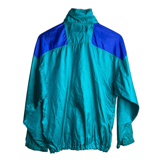 Chaqueta cortavientos vintage Columbia de La Pichilemina en tonos turquesa y azul eléctrico con diseño retro