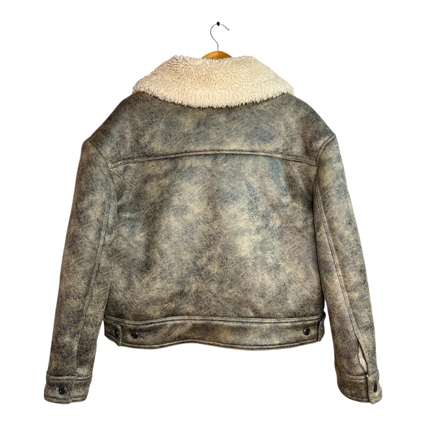 Chaqueta estilo aviador La Pichilemina de cuero desgastado en tonos tierra con cuello de chiporro crema vista trasera