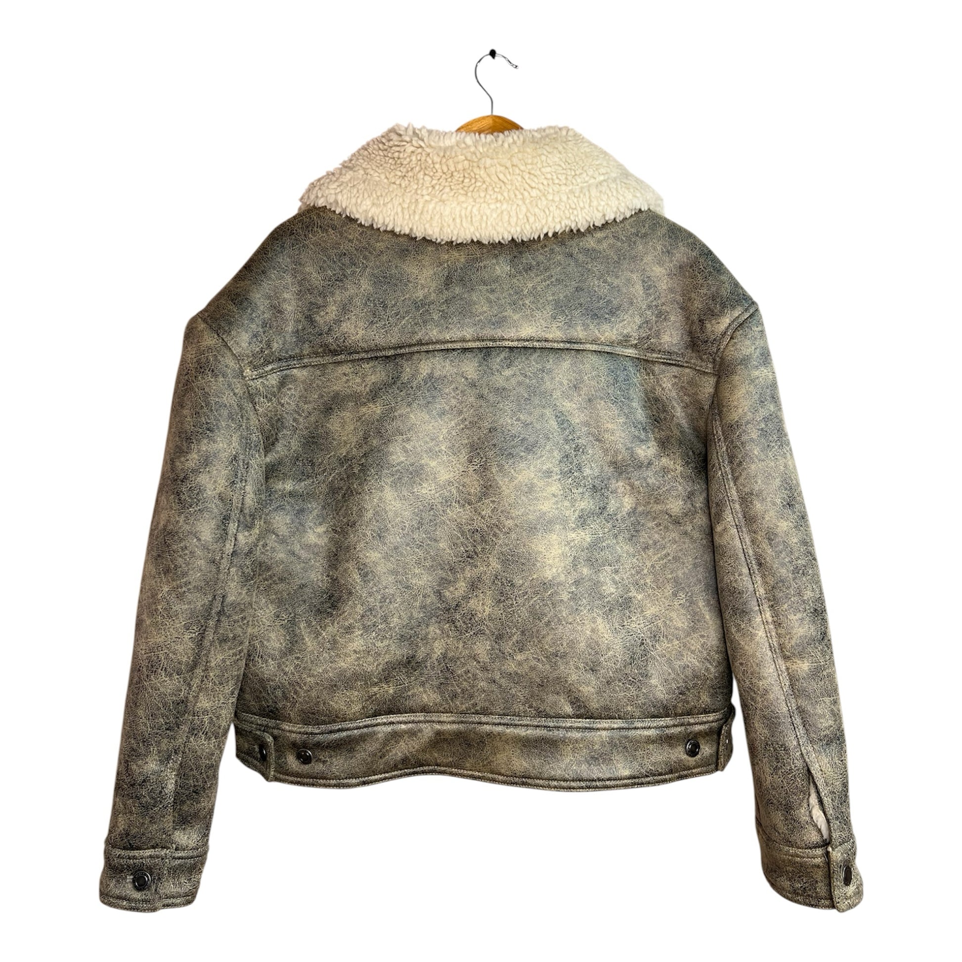 Chaqueta estilo aviador La Pichilemina de cuero desgastado en tonos tierra con cuello de chiporro crema vista trasera