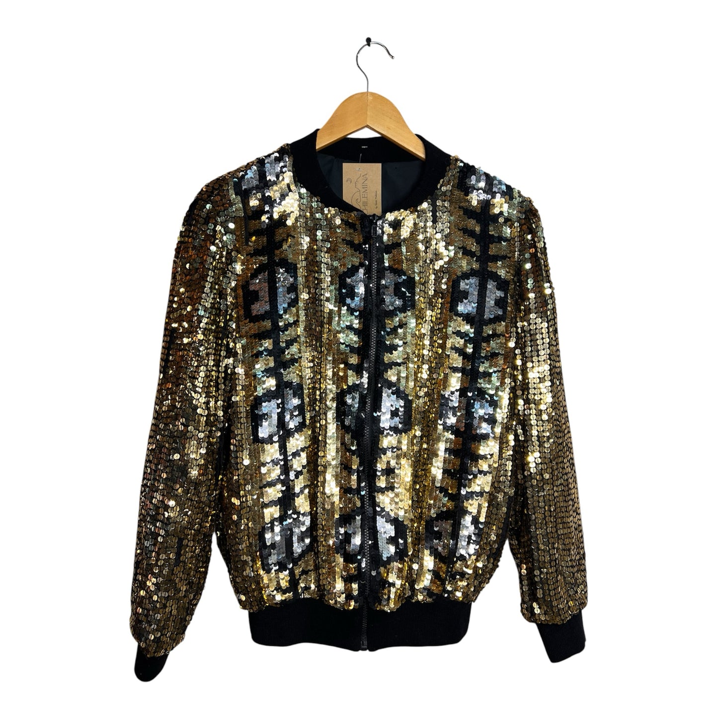 Chaqueta bomber La Pichilemina con lentejuelas doradas, plateadas y negras en patrón geométrico y rib negro.