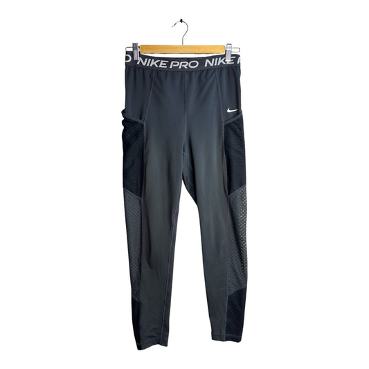 Leggings deportivos La Pichilemina Nike Pro negros con paneles de malla laterales y cintura elástica con logo