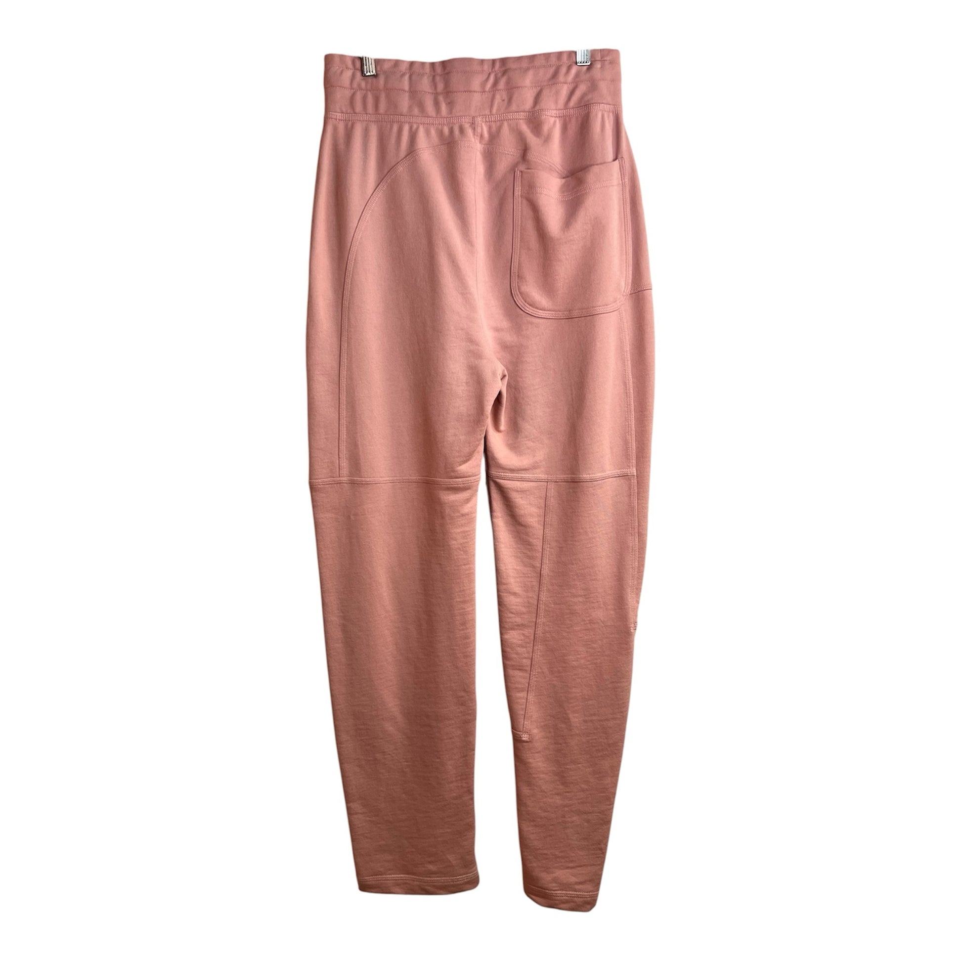 Pantalón jogger La Pichilemina de algodón rosado con cintura elástica y bolsillo trasero, vista posterior.